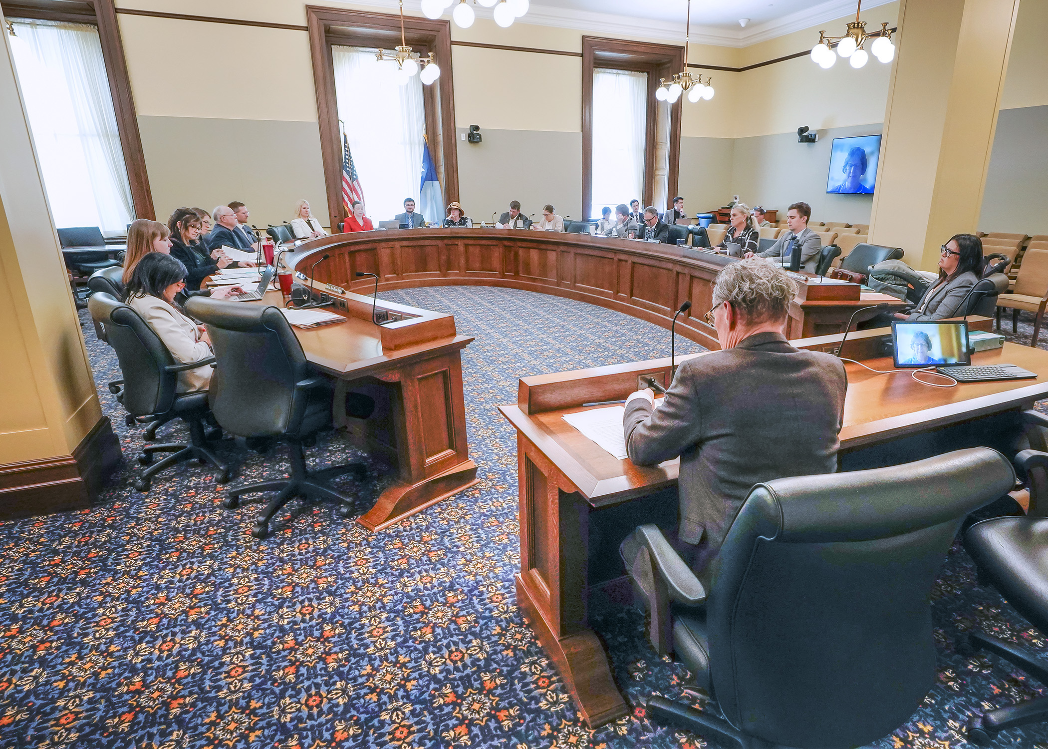 Rep. Danny Nadeau presents HF633 to the House Children and Families Finance and Policy Committee Feb. 18. The bill would create a new property tax exclusion for licensed in-home child care providers. (Photo by Andrew VonBank)